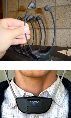 Two photos of the assisted listening receiver, one in the charging station and one worn by a person in front of their neck.